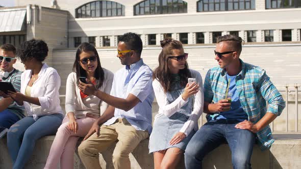 Students with Smartphones and Tablet Pc in City 43