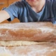 Closeup of Little Boy Rolling Dough with Rolling Pin for Making Pizza - VideoHive Item for Sale