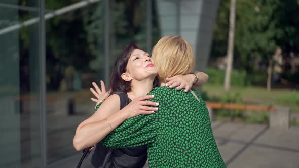 Side View Woman Imitating Happiness Hugging Friend Making Dissatisfied Irritated Facial Expression