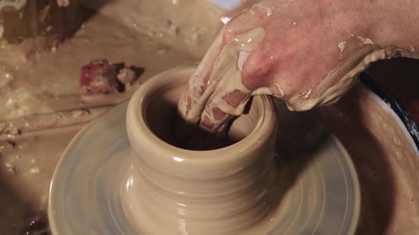Pottery Crafting  Hands Forms Clay in the a Small Pot Shape