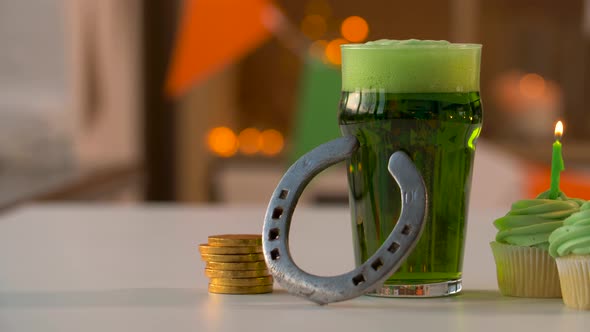 Glass of Beer, Cupcakes, Horseshoe and Gold Coins