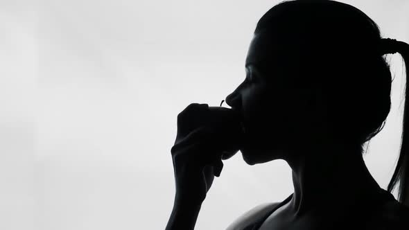 Silhouette of Woman Biting Apple, Healthy Weightloss Diet, Lady Eating Fruit