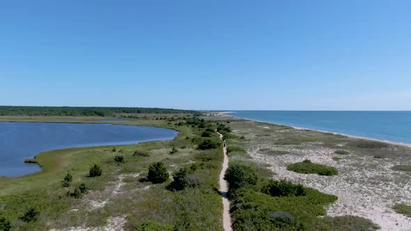 Aerial view of waterlands , ocean and walking path through national research reserve