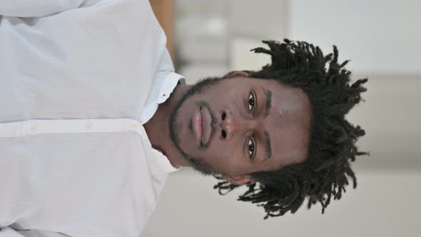 Portrait of Serious African Man Looking at the Camera 