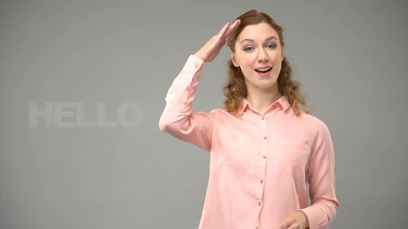 Woman Saying Hello in Sign Language, Text on Background, Communication for Deaf