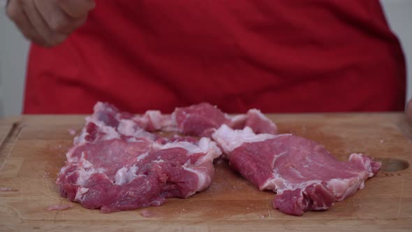 Person Beats the Meat with a Kitchen Hammer