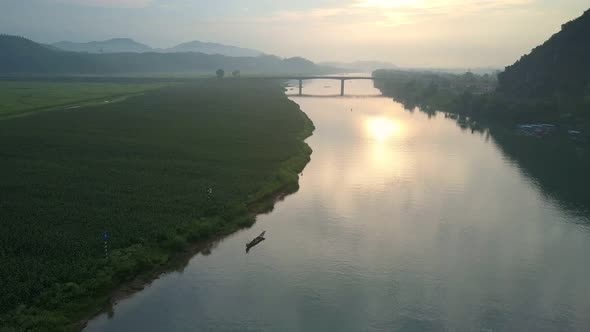 Beautiful Wide River Runs Along Boundless Green Fields