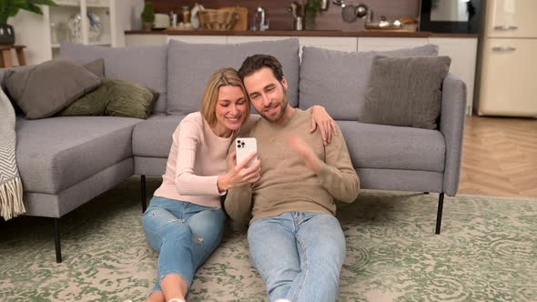 Positive Couple Using Smartphone for Video Call