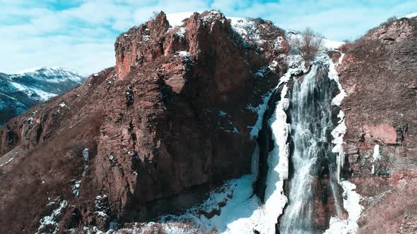 Waterfall Flowing in Winter