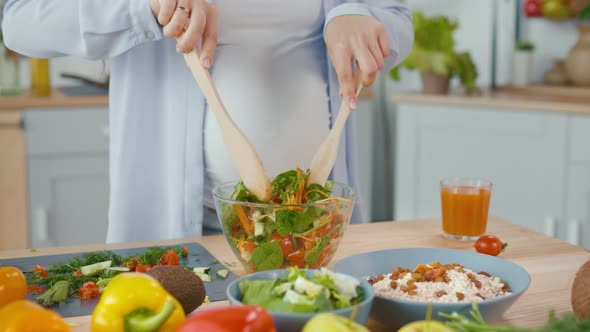 Pregnant Woman Preparing Organic Healthy Food