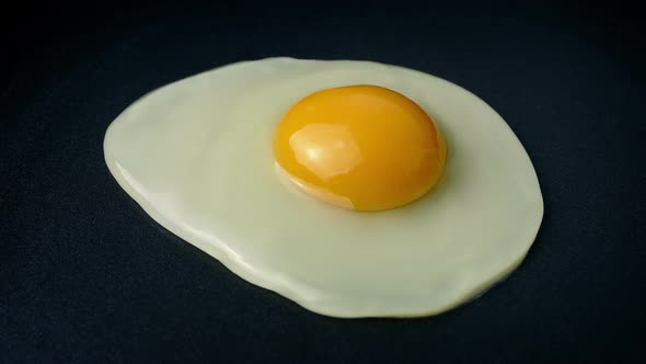 Perfect Egg Breaks Into Frying Pan And Cooks