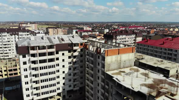 Circling an unfinished building.