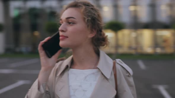 Woman Calling By Smartphone in City