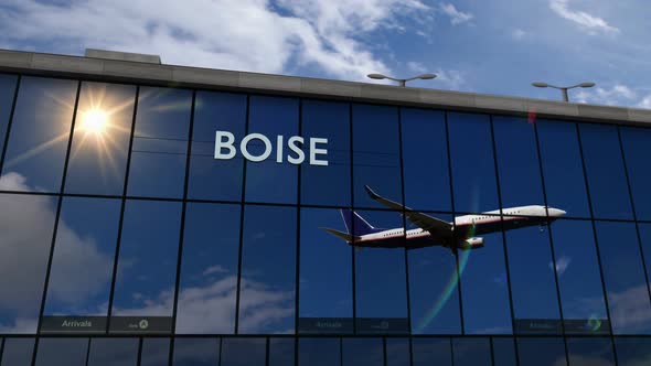 Airplane landing at Boise Idaho, USA airport mirrored in terminal