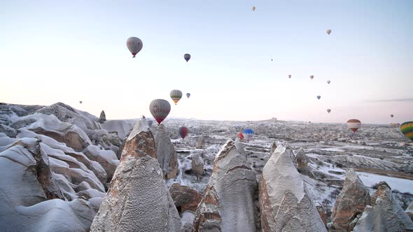 Multi-colored Balls in Cappadocia on the Background of Volcanic Rocks.