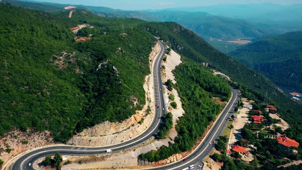 Traffic Motion on a Highway Road in the Mountains