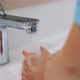 Closeup Shot of a Child Washing Hands - VideoHive Item for Sale