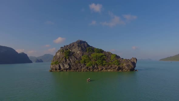 Small Fishing Boat In The Gigantic Bay  - The Part Of Ha Long Bay - Vietnam
