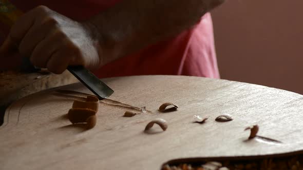 Luthier Manufacturing with a Gouge