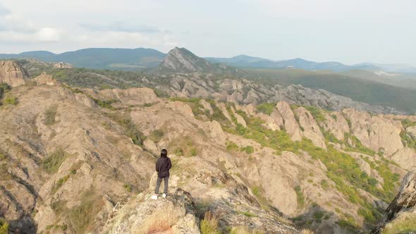 Fly Over Girl Standing With Birtvisi Panorama