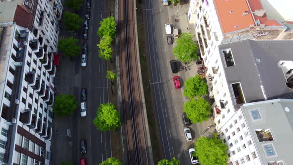 Go to work, panorama of long wide street in the middle of Berlin. Gorgeous aerial view flight slowly