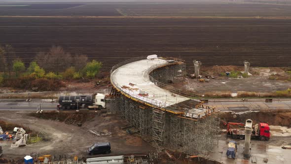 Drone Orbit Shot of the Concrete Overpass Construction