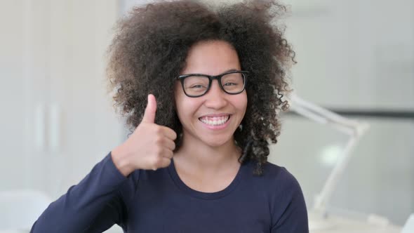 Portrait of African Woman Showing Thumbs Up Sign