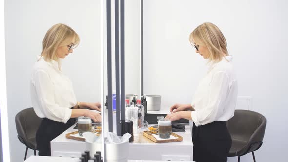 Makeup Specialist Puts the Workspace in Order Before the Client's Arrival