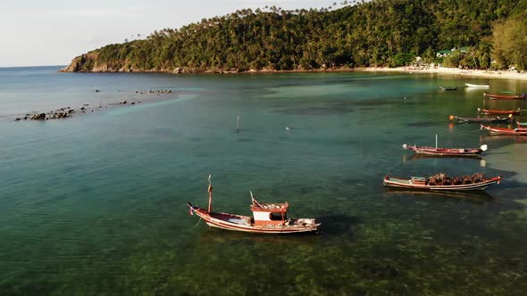 Boats Near Shore of Island