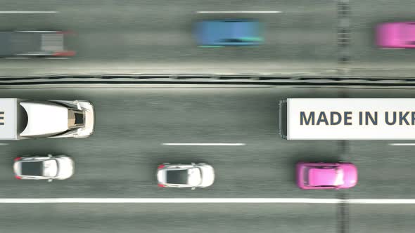 Semitrailer Trucks with MADE IN UKRAINE Text alt
