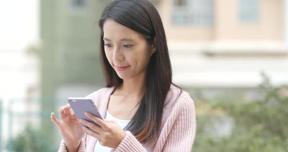 Young woman using mobile phone