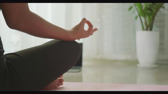 Woman teaching yoga online first step is meditation zen for working out