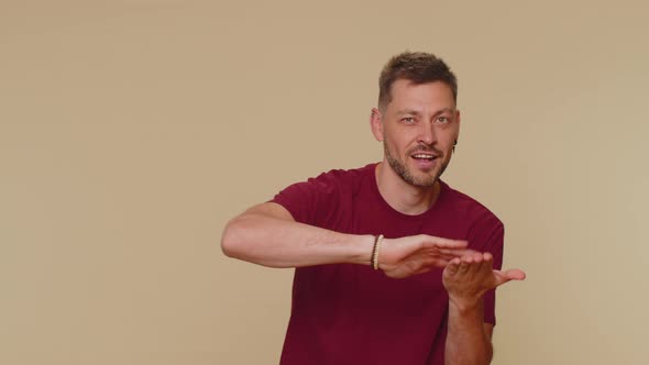 Bearded Handsome Young Man Showing Wasting or Throwing Money Around Hand Gesture More Tips Earnings