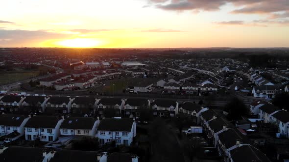 Aerial - A residential of Lucan, a magic hour cold day with a sunset view from above of the houses a
