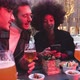 Group of four multiethnic friends sitting outdoor clubbing using smartphone - VideoHive Item for Sale