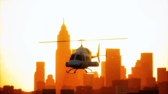 Silhouette Helicopter at City Scape Background