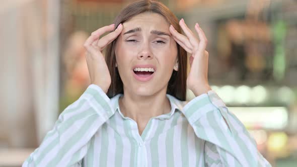 Exhausted Young Latin Woman Having Headache