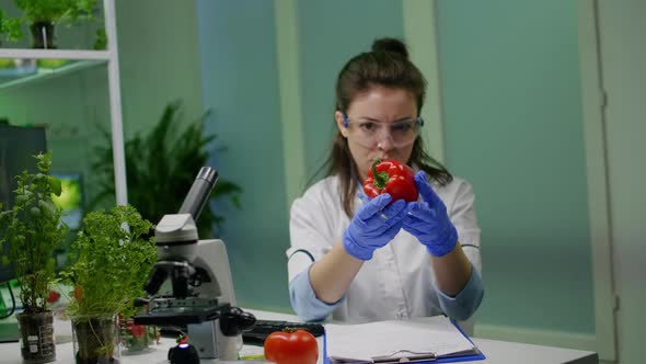 Biologist Woman Examining Pepper Writing Microbiology Medical Expertise alt