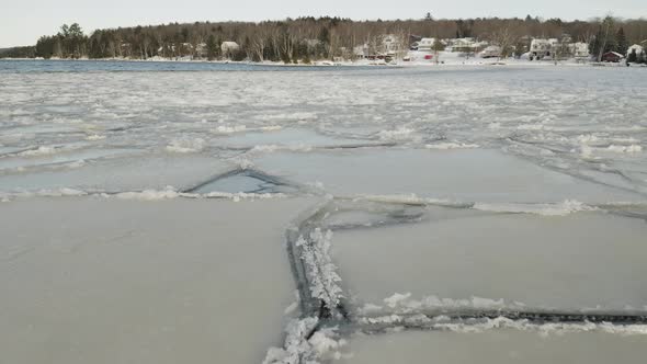 Ice sheets forming over lake Winter Aerial