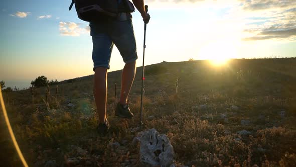 Male Walking Along the Mountain Hike Travel on the Bright Sunset Background Spbd