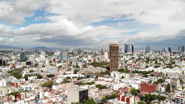 Aerial in Southern Mexico City With a Blue Sky