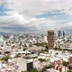 Aerial in Southern Mexico City With a Blue Sky - VideoHive Item for Sale