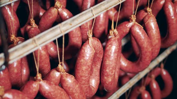 Smoked Tied-up Sausages Storaged in the Factory Fridge