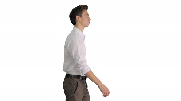 Young Businessman in White Shirt Starts Walking on White Background