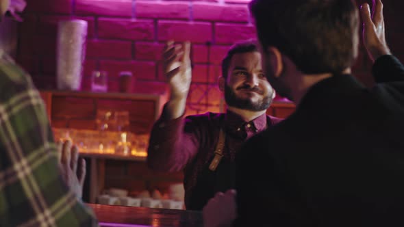 In a Pub Great Looking Smiling Faces Bartender