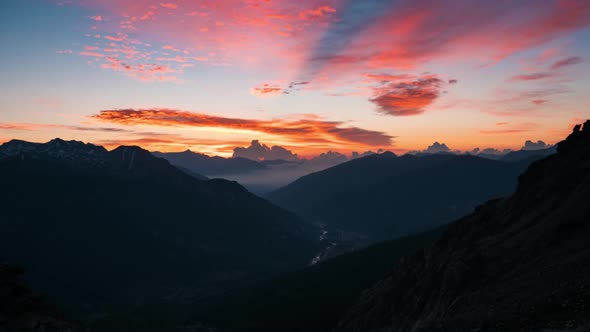 Time lapse: panorama on Susa Valley (Valle di Susa) dramatic aerial view at sunrise, Italy