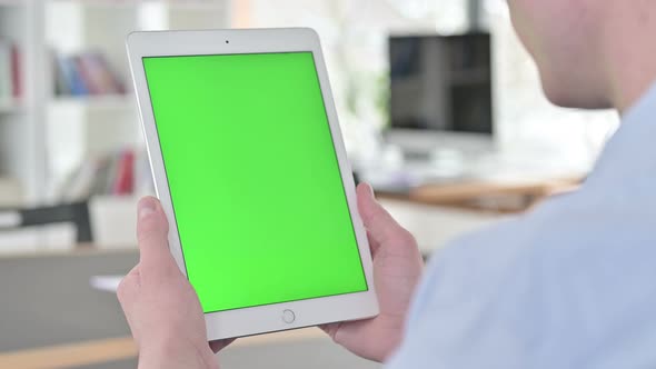 Man Holding Chroma Key Tablet, Green Screen