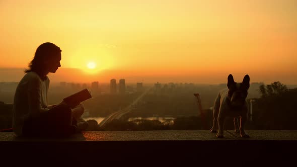 A Female Studying at the Dawn