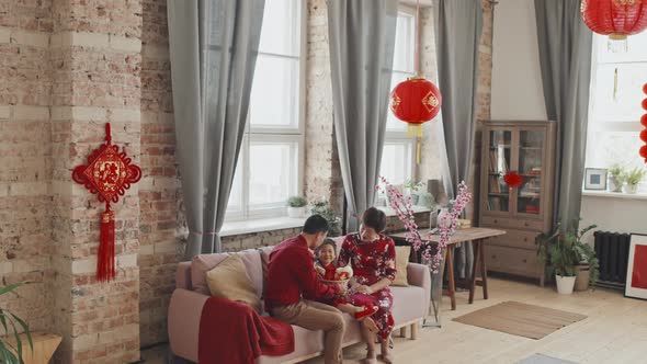 Chinese Family Celebrating Lunar New Year at Home