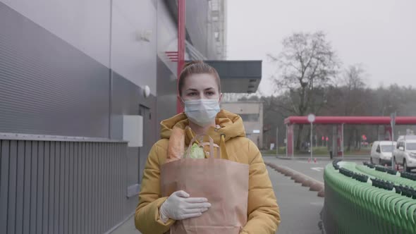 Young Woman with Purchases From the Supermarket